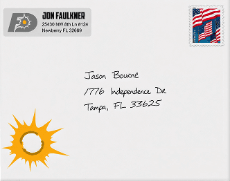 A custom envelope with a printed return label, handwritten address, and real postage stamp